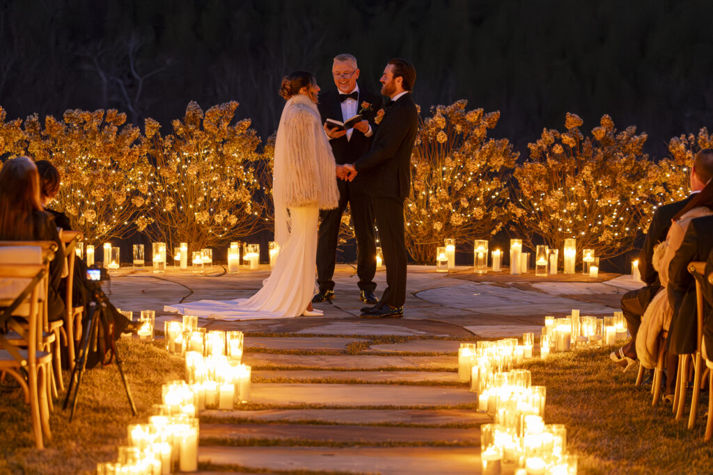A candlelit New Years Eve wedding ceremony at The Seclusion, a luxury Virginia wedding and event venue.