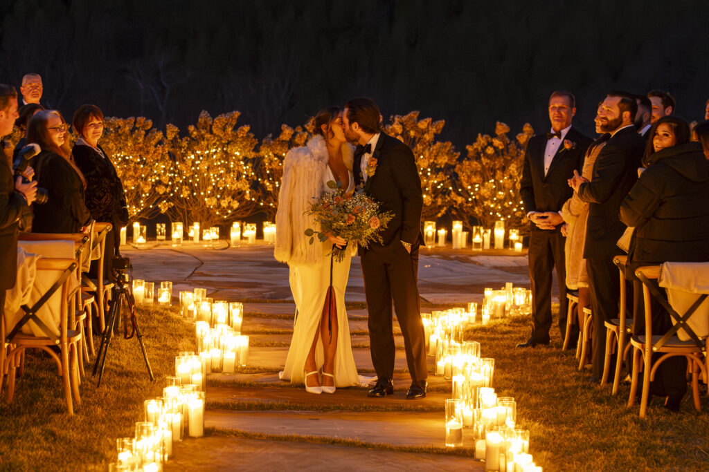 A couple kissing at The Seclusion, a luxury Virginia wedding and event venue.